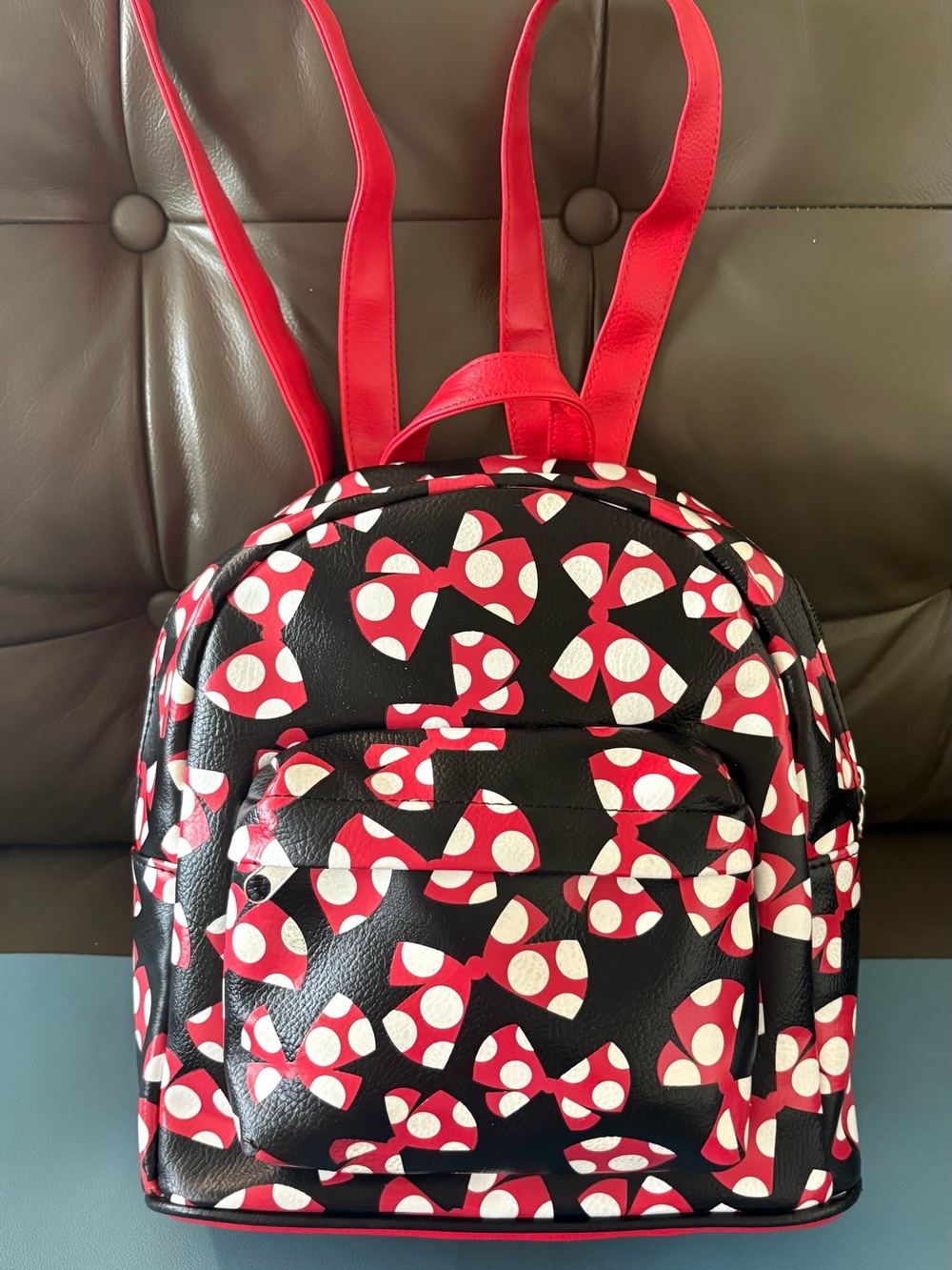 Disney Black Mini Backpack with Red and White Bow Pattern